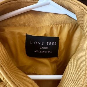 Mustard yellow puffer vest